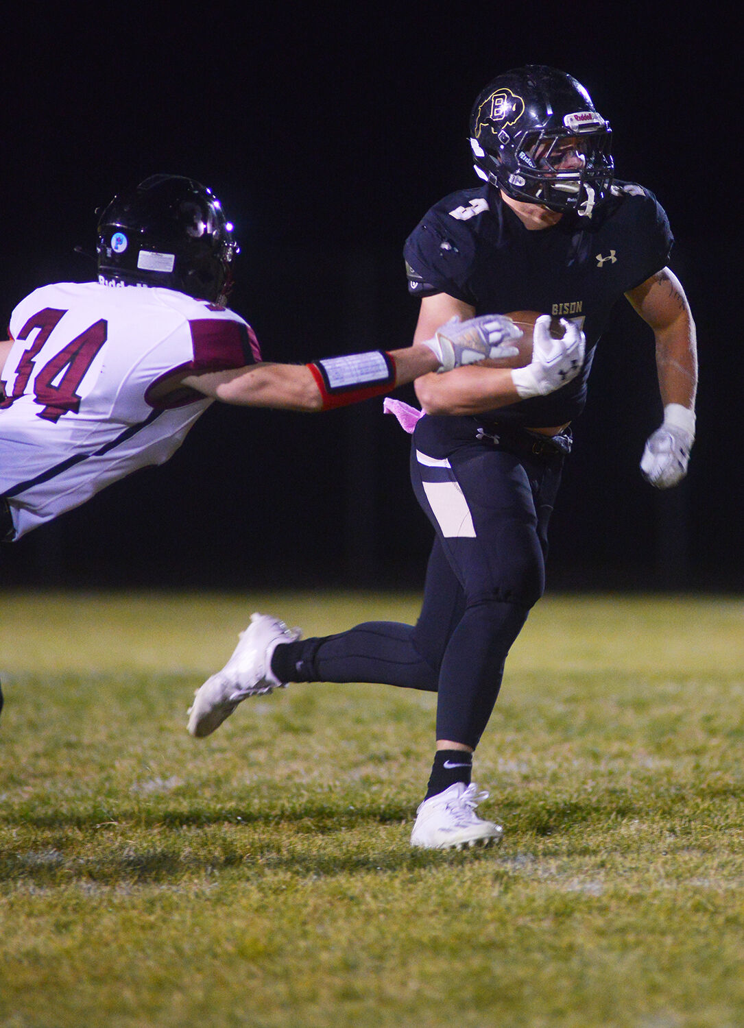 Hyrum Hatch dodges the first of several tackles before making it into the end zone